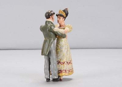 Lot 360 - A first quarter of the 19th century German carved wooden dancing couple