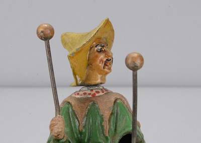 Lot 365 - A late 19th century pair of cast metal Chinamen probably from a music box mechanism