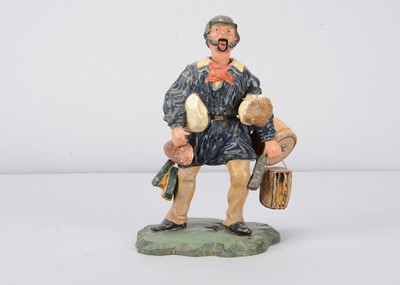 Lot 380 - A mid 19th century German papier-mâché delivery man nodder