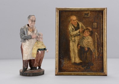 Lot 383 - A mid 19th century Thüringen papier-mâché barber cutting the hair of a boy