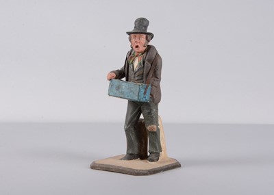 Lot 388 - A mid 19th century Thüringen composition street vendor nodder