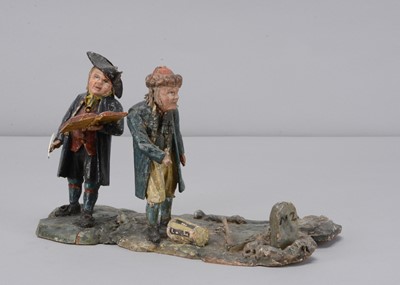 Lot 392 - A mid 19th century Rhöner carved wooden vignette of two men