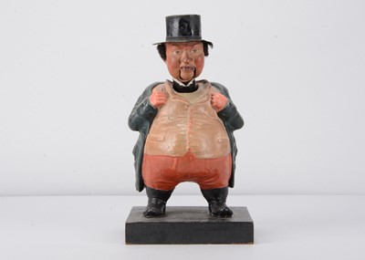 Lot 423 - A mid 19th century Thüringen papier-mâché nodder, probably Dickens’s Tony Weller