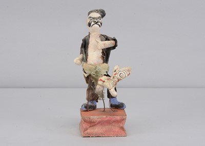 Lot 436 - A Japanese composition Kabuki actor squeak toy