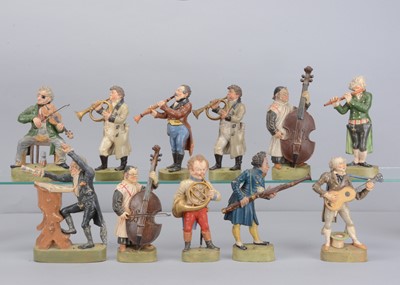 Lot 441 - Eleven early 20th century pottery flat-back musician, possibly French