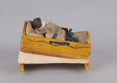 Lot 443 - A mid 19th century Thüringen rocking cradle squeak toy