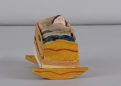 Lot 443 - A mid 19th century Thüringen rocking cradle squeak toy