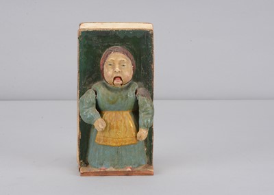 Lot 451 - A mid 19th century Thüringen papier-mâché crying child squeak toy