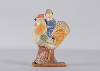 Lot 454 - A mid to late 19th century papier-mâché boy riding a cockerel