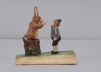 Lot 455 - A late 19th century Thüringen boy rabbit hunting squeak toy