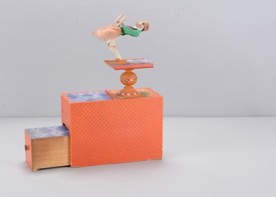 Lot 464 - A mid 19th century German acrobat tumbling toy