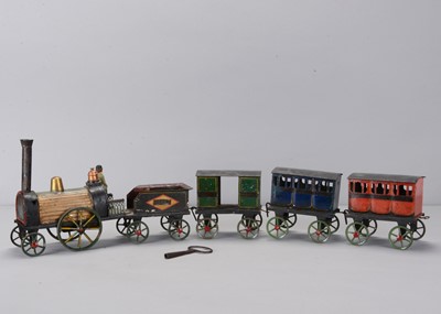 Lot 470 - A late 19th century Dessien Simon clockwork tinplate floor train