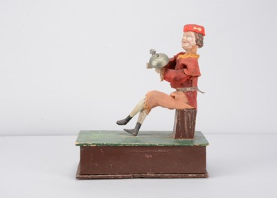 Lot 472 - A mid 19th century Thüringen pull-along boy striking bell