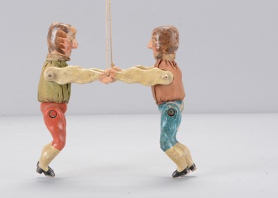 Lot 489 - A mid to late 19th century German wrestling toy