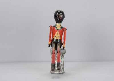 Lot 496 - A late 19th century turned wooden folk art black jigger