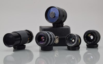 Lot 4 - An Olympus OM and for Olympus Lenses