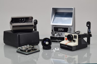 Lot 164 - Two Polaroid Cameras and Camera Related Items