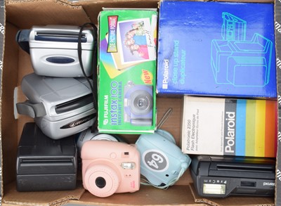 Lot 217 - Polaroid and Instant Cameras