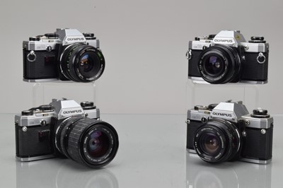 Lot 223 - Four Olympus OM-10 SLR Cameras