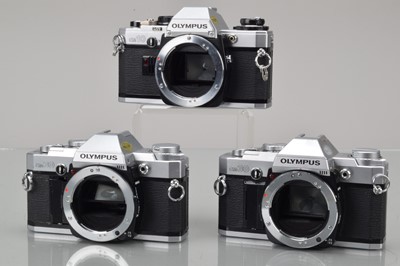 Lot 369 - Three Olympus OM SLR Camera bodies