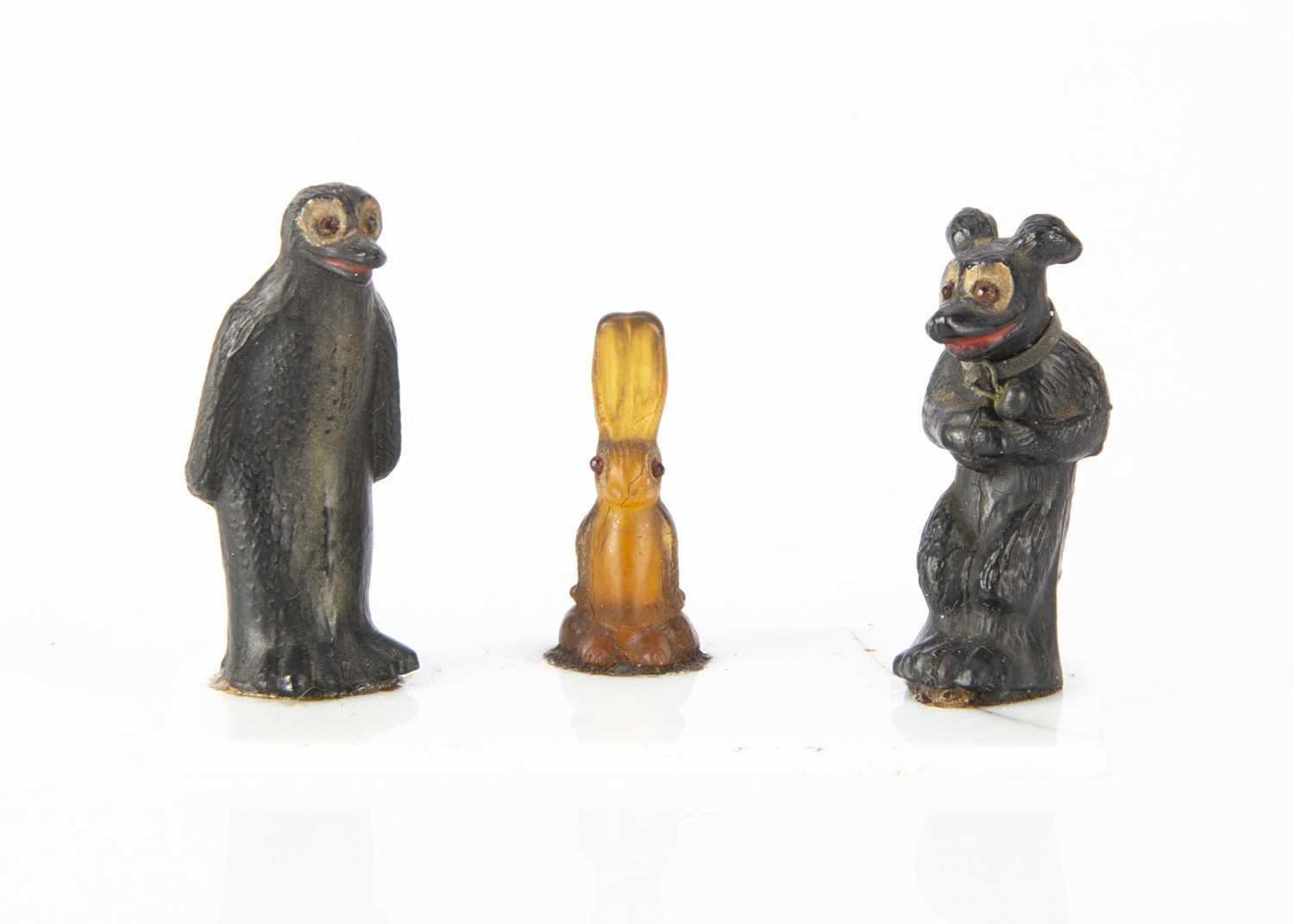 Lot 72 - A rare Pip Squeak & Wilfred glass cracker charms