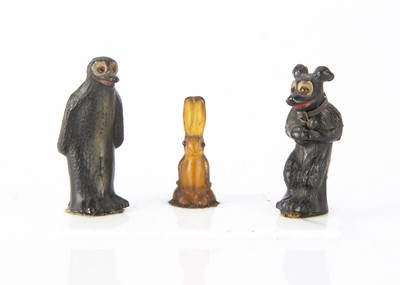 Lot 72 - A rare Pip Squeak & Wilfred glass cracker charms