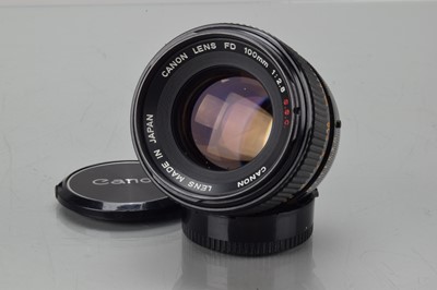 Lot 397 - A Canon FD 100mm f/2.8 S.S.C. Lens.