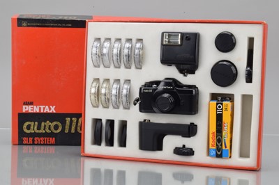 Lot 408 - A Pentax Auto 110 Outfit