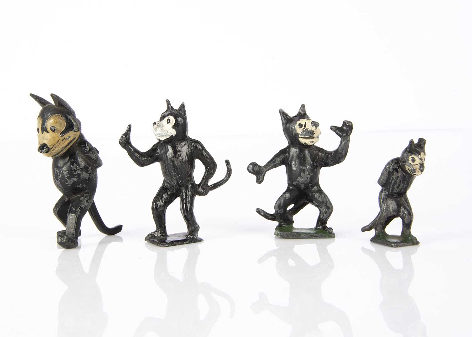 Lot 79 - Hollow-cast lead Felix the Cats late 1920s