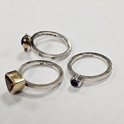 Lot 89 - A set of silver gem set stacking rings