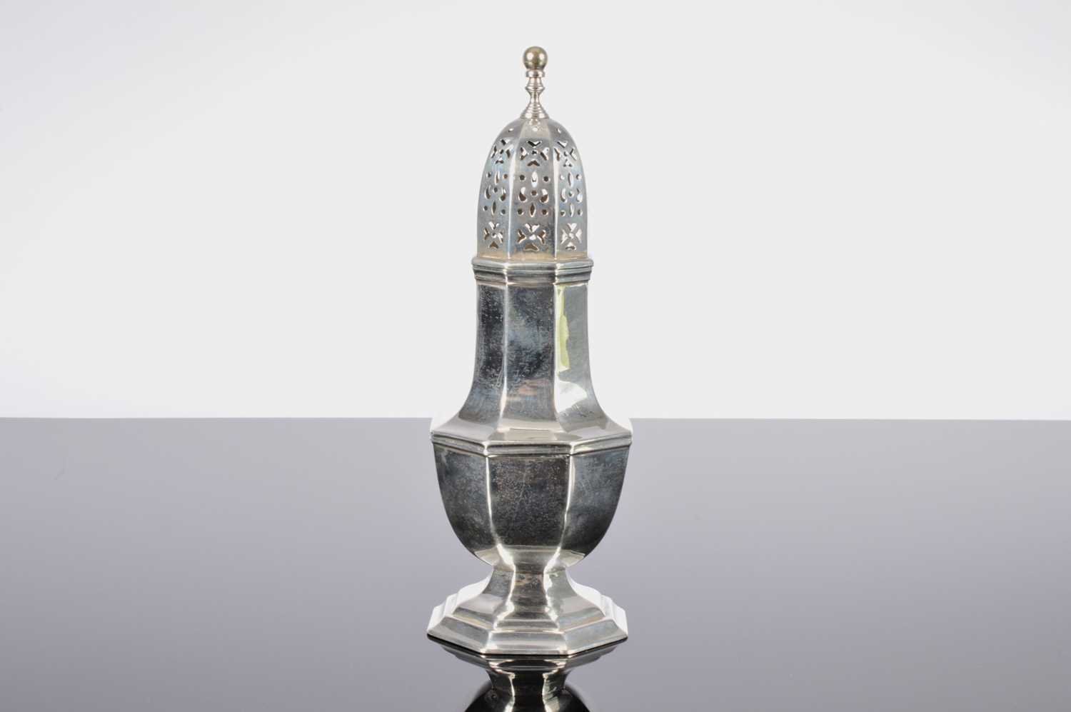 Lot 249 - An Edwardian silver sugar sifter by Olivant & Botsford