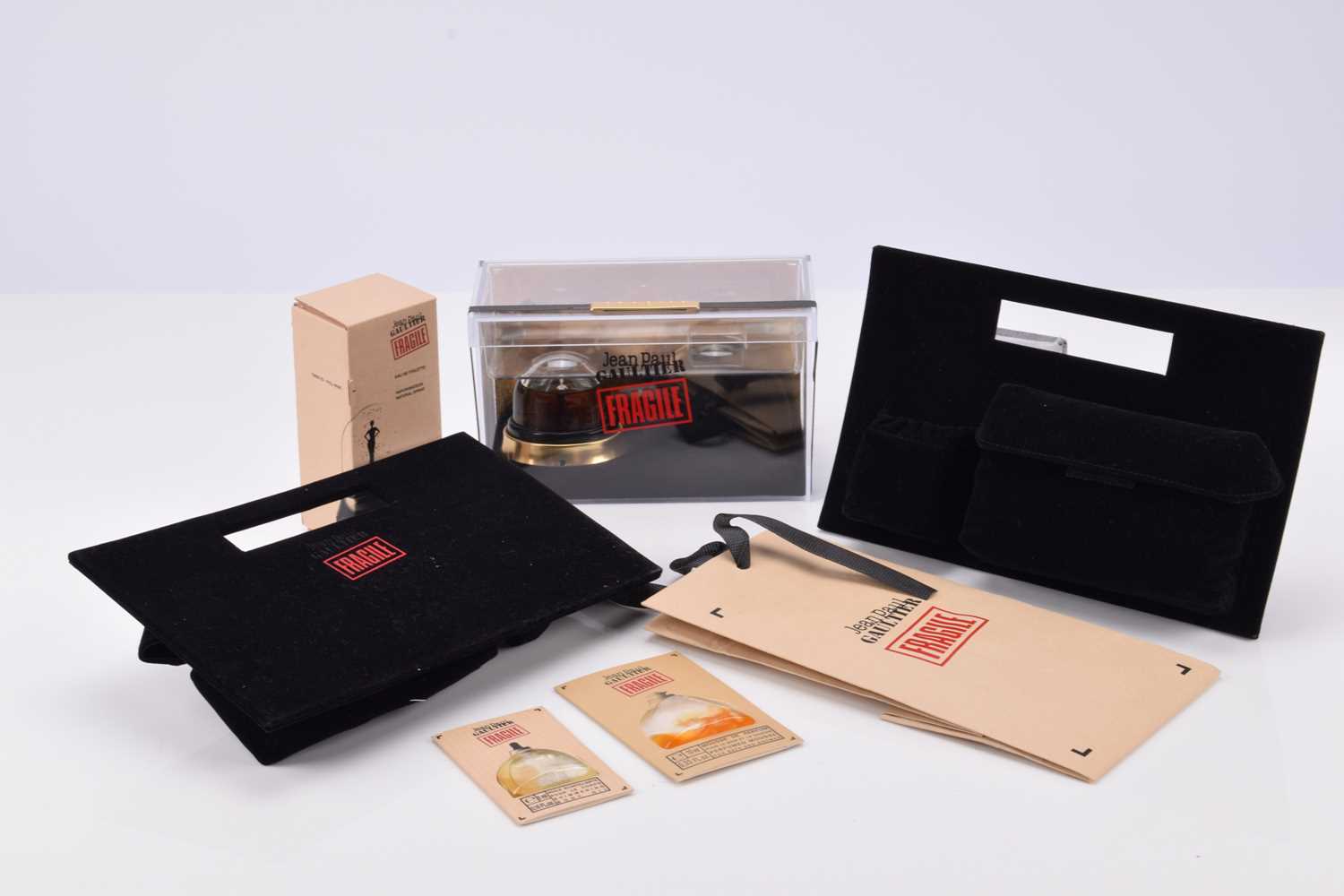 Lot 464 - A collection of Jean Paul Gaultier Fragile fragrances and display accessories