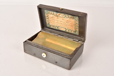 Lot 87 - A Bakelite Musical Snuff Box