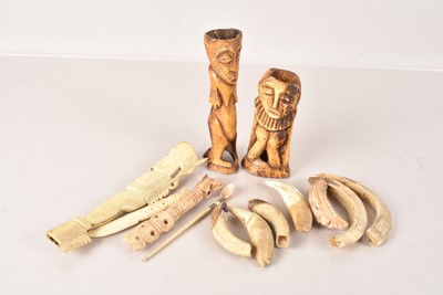 Lot 211 - An assortment of items made from bone