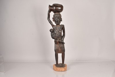 Lot 255 - A large carved wooden figure of a female