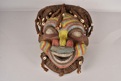 Lot 256 - A carved and beaded African Bamileke Mask