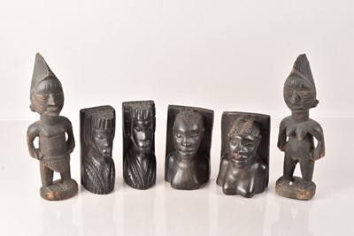 Lot 264 - Two pairs of African carved wooden bookends