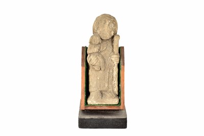 Lot 361 - A weathered stone effect figure of St Christoper carrying Christ