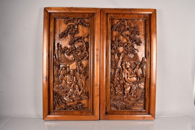 Lot 445 - A pair of Oriental Hardwook panels