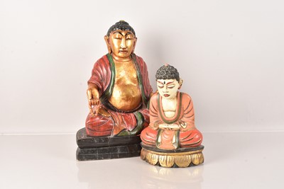 Lot 466 - Two Middle Eastern Carved Wooden Praying Buddhas