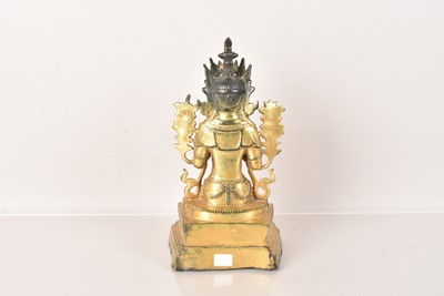 Lot 487 - A Sino-Tibetan gilt bronze of Buddha
