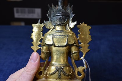 Lot 487 - A Sino-Tibetan gilt bronze of Buddha