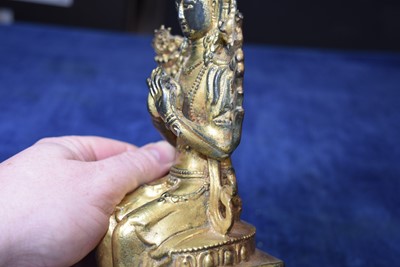 Lot 487 - A Sino-Tibetan gilt bronze of Buddha