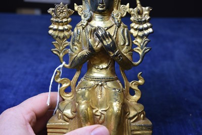 Lot 487 - A Sino-Tibetan gilt bronze of Buddha