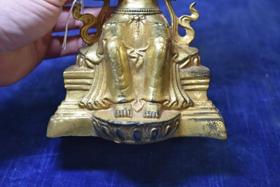 Lot 487 - A Sino-Tibetan gilt bronze of Buddha