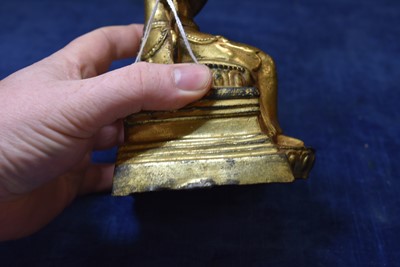 Lot 487 - A Sino-Tibetan gilt bronze of Buddha