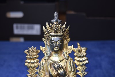 Lot 487 - A Sino-Tibetan gilt bronze of Buddha