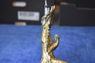 Lot 487 - A Sino-Tibetan gilt bronze of Buddha