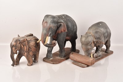 Lot 506 - Three Carved Wooden Elephant Figures