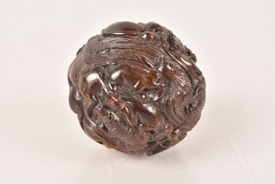 Lot 519 - A Chinese Hardwood carved Netsuke